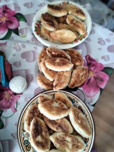 Piroskhi- stuffed fry breads with meat potatoes